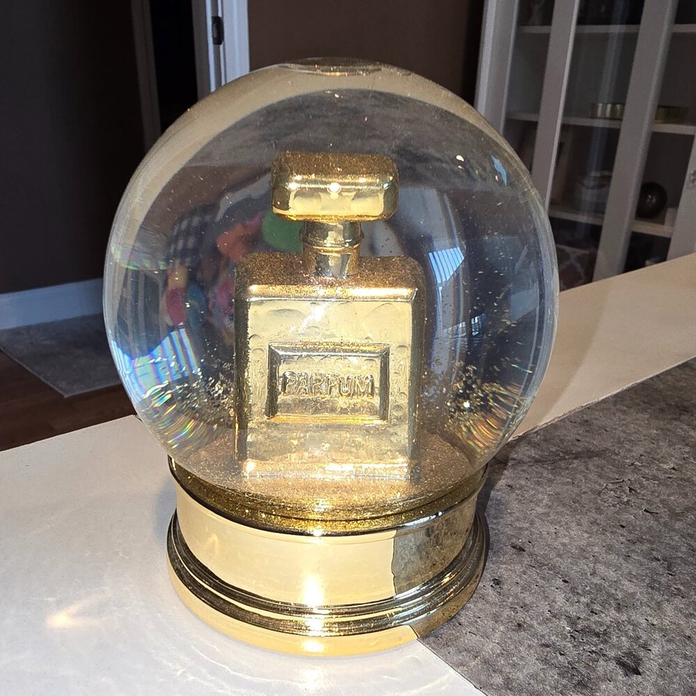 Z Gallerie Snow Globe with Perfume bottle inside.